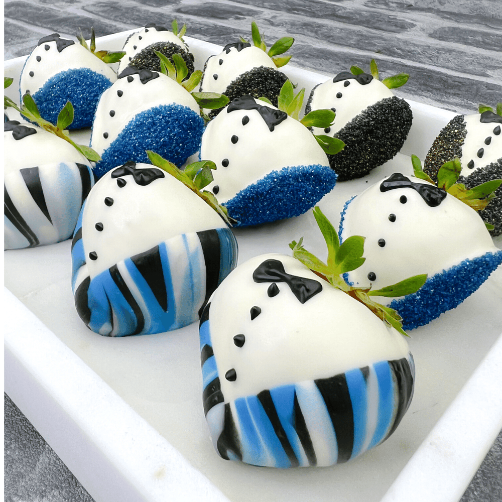 marbled tuxedo chocolate covered strawberries with edible glitter